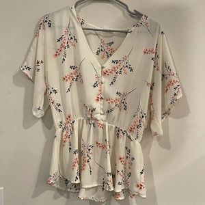 Sienna sky Flowy flower peplum shirt